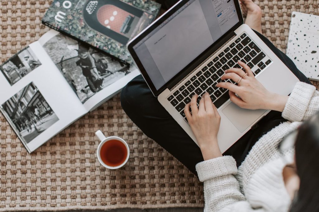 Person using laptop computer for Affiliate Marketing.